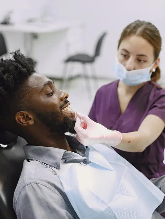 Dentist providing care to a patient