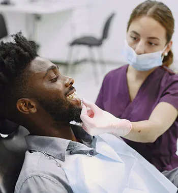 Dentist providing care to a patient